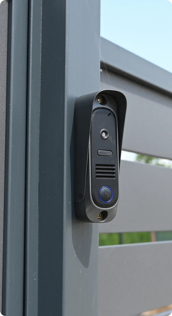 Doorbell camera on metal gate